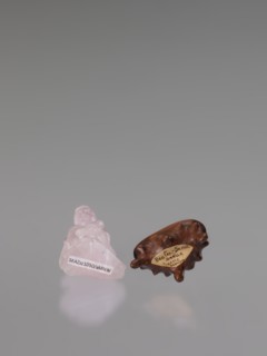 Guanyin on a base; carved rose quartz figurine, full sculpture with engraving; goddess from Chinese