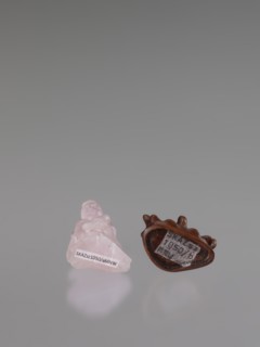 Guanyin on a base, figurine carved in rose quartz, full sculpture with engraving, 19th century