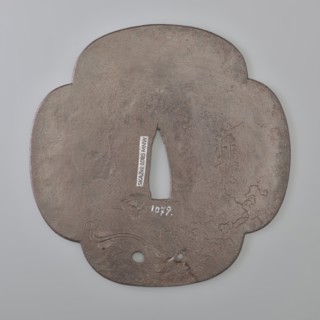 Crossguard tsuba, Kaneie; craft: tsuba; maker/school: Kaneie; gift; Japanese; Edo 1603–1868; 18th