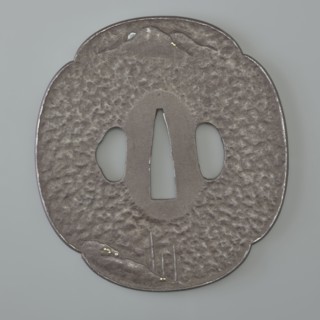 Crossguard tsuba, attributed to Kaneie craftsman/school. Tsuba in the shape of a quatrefoil mokkô