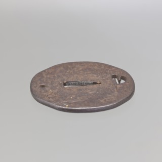 Crossguard tsuba, Kaneie,  school craftsman author. Japanese, 18th century Edo period, 1603–1868.