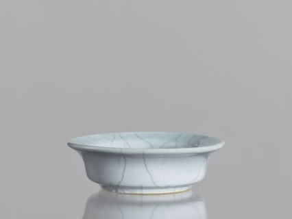 Flowerpot saucer, Chinese ceramics, Qing 1644–1911, 19th century. Grey-blue glaze with cracklework.