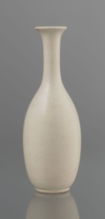 Vase on saucer. Vase made of stoneware or thick porcelain?, ovoid with a long cylindrical neck