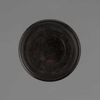 Vase on saucer. Vase made of stoneware or thick porcelain?, ovoid with a long cylindrical neck,