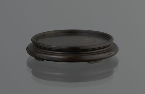 Vase on saucer. Vase made of stoneware or thick porcelain?, ovoid with a long cylindrical neck