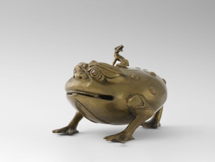 Incense burner with a cover — moon frog toad. Cast in bronze studded with copper. Popular motif in