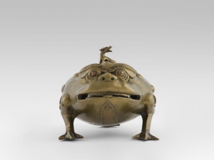 Incense burner with a cover — moon frog toad. Cast in bronze studded with copper. Popular motif in