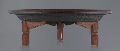 Ritual vessel, Burmese, 19th/20th century. Tray with a fluted surface showing a visible bamboo