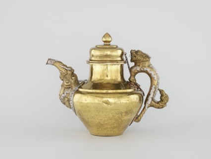 Teapot, Tibetan, 19th century. Jug with a lid on a chain; dragon-shaped handle, spout probably in