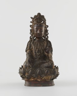 Guanyin, unknown creator; sculptor unknown. Chinese Buddhist bodhisattva figurine on a lotus throne