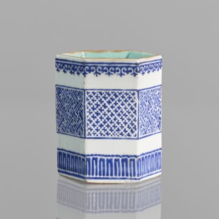 Bowl holder, hexagonal prism-shaped container used as an incense vessel. Porcelain body with white