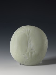 Plaque-lid, maker, 19th century Qing dynasty 1644–1911, China. Bas-relief carved jade plaque-lid