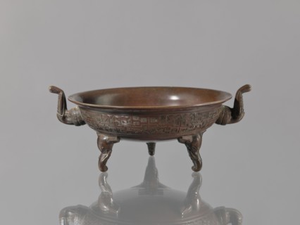 Ding vessel, Ding vessel with three legs and two handles; used for ritual hand washing. Bronze.