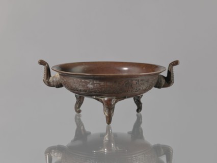 Ding vessel, Ding vessel with three legs and two handles; used for ritual hand washing. Bronze.