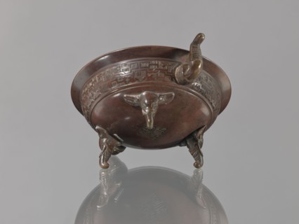 Ding vessel, Ding vessel with three legs and two handles. Used for ritual hand washing. Bronze.