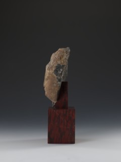 Head of Guanyin Bodhisattva, sculptor unknown. Polychrome-coated feldspar fragment of a statue with