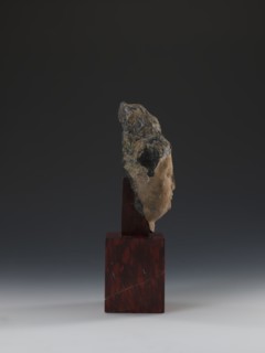 Head of Guanyin Bodhisattva, unknown sculptor; polychrome-coated feldspar fragment of a statue with