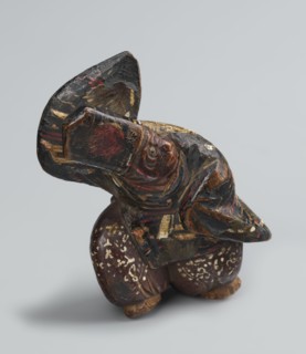 Netsuke in the shape of a sanbasô dancer, Japanese, Edo period 18th century, netsuke figurine