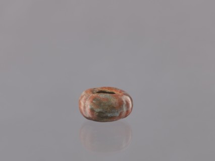 Cosmetic vessel, hand-made vessel. Vessel head made of yellowish clay, hand-formed. Reddish glaze