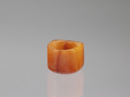 Signet ring, Chinese, Qing dynasty 1644–1911, opaque amber with convex relief, 18th–19th century,