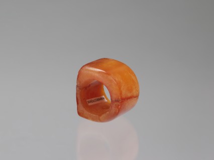 Signet ring, Chinese, Qing dynasty 1644–1911, 18th–19th century. Opaque amber with convex relief