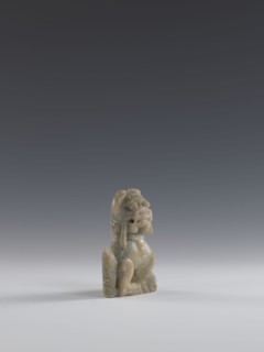 Seated lion, Chinese, Qing dynasty 1644–1911. Figurine carved in soapstone elephantine, engraved.