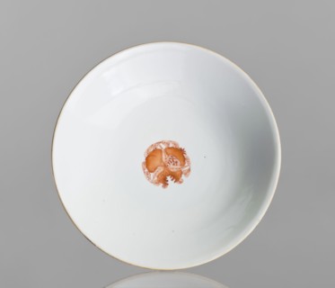 Platter, Chinese, 19th century. Porcelain platter on a tall, widening foot, white glaze, height 11
