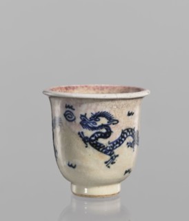 Bowl, Chinese, 19th century. Blue-and-white porcelain bowl with rolled edge and small foot.