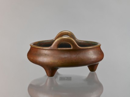 Li-type incense burner, Chinese, cast in golden-red bronze with light reddish-brown patina.