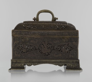 Box; Persian Qajar dynasty, 19th century. Rectangular box on four feet with a lid and a handle on