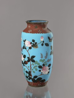 Vase. Cloisonné enamel on copper with brass rims at the spout and foot. Short, slightly flared neck