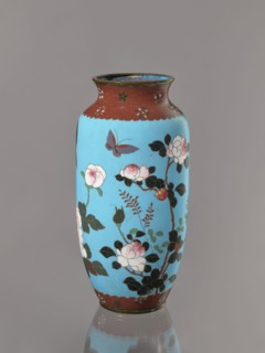Vase. Cloisonné enamel on copper with brass rims at the spout and foot. Short, slightly flared neck