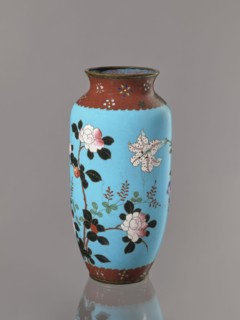 Vase. Cloisonné enamel on copper with brass rims at the spout and foot. Short, slightly flared neck