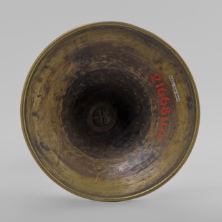 Candlestick, early 20th century, Korea; candlestick on a round base transitioning into a
