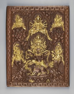 Garuda surrounded by other Buddhist deities; inscriptions; snakes; Kalachakra symbol; sculpture
