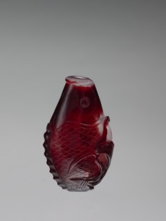 Snuffbox with spoon;, Red and white stained glass snuffbox decorated with bottles and carp fish;
