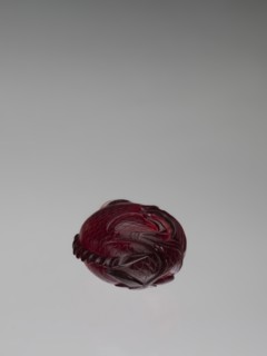 Snuffbox with spoon;, Red and white stained glass snuffbox decorated with bottles and carp/ fish
