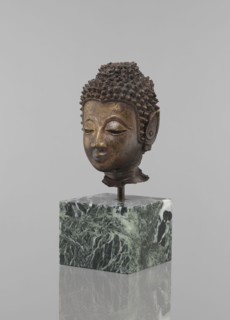 Buddha head - fragment of a sculpture, Buddhist art, Buddhism, art of Southeast Asia, Thai art,