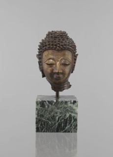 Buddha head - fragment of a sculpture, Buddhist art, Buddhism, art of Southeast Asia, Thai art,