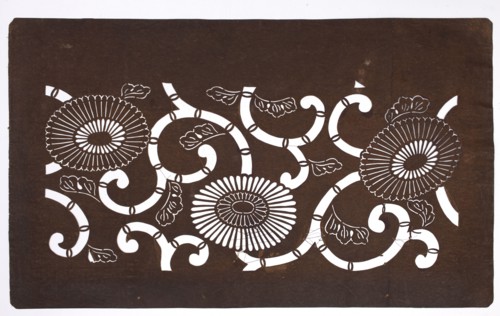 Dyeing stencil katagami with a motif of stylized chrysanthemums and plant tendrils kawari kiku ni