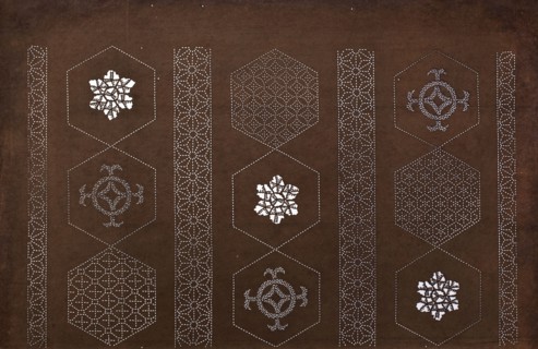 Katagami dyeing stencil with a striped motif of hemp leaves and hexagons asanoha to kikkô no shima
