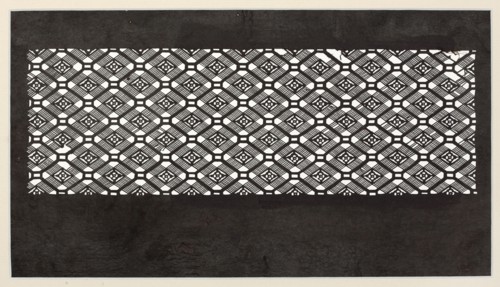 A katagami dyeing stencil for painting kimono, cut into a koshi check ornament with small floral