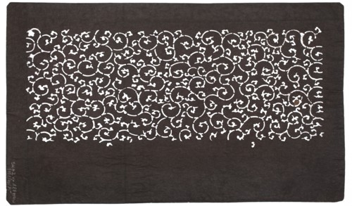 Katagami dyeing stencil cut into a pattern of stylized plant tendrils karakusa; maker, stencil;