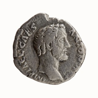 Denarius, 138 CE. Obverse: head of Antoninus Pius without a cap to the right, legend IMP T AEL CAES