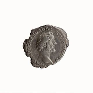 Denarius; obverse: head of Antoninus Pius uncovered to the right, legend IMP T AEL CAES HADRI -