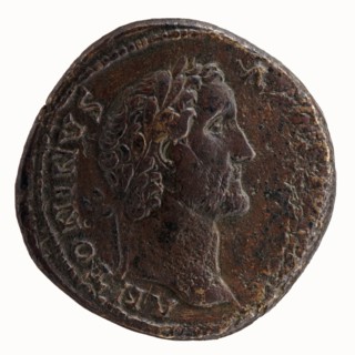 Sestertius of Antoninus Pius 86–161; Roman Emperor 138–161. Obverse: head of Antoninus Pius in a