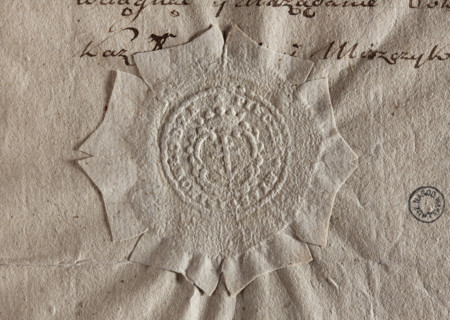 Round seal impression of the town of Inowlódz, Leczyca Voivodeship. In a decorative cartouche the