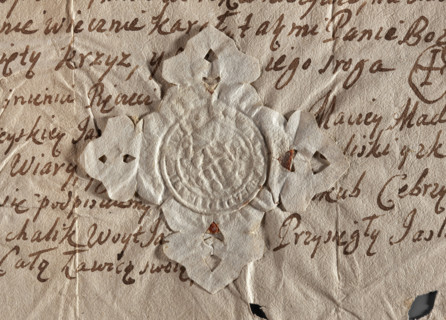 Round seal impression of the town of Jasliska, Ruthenian Voivodeship. On a baroque shield, two