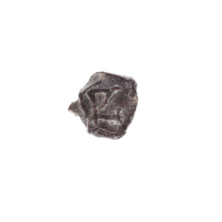 Fragment of a double-sided Drohiczyn seal. On one side, a cross with one arm ending in a triangle
