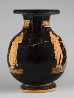 Red-figure pelike depicting a woman putting on a pearl necklace; Southern Italic (Apulian) pottery,